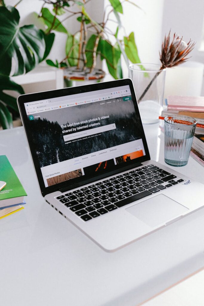 macbook pro on white table